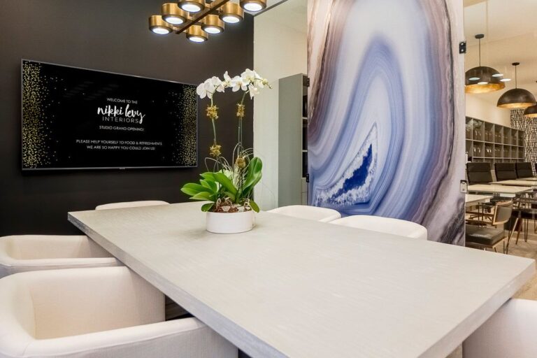 Interior design studio with modern furnishings and welcoming signage.
