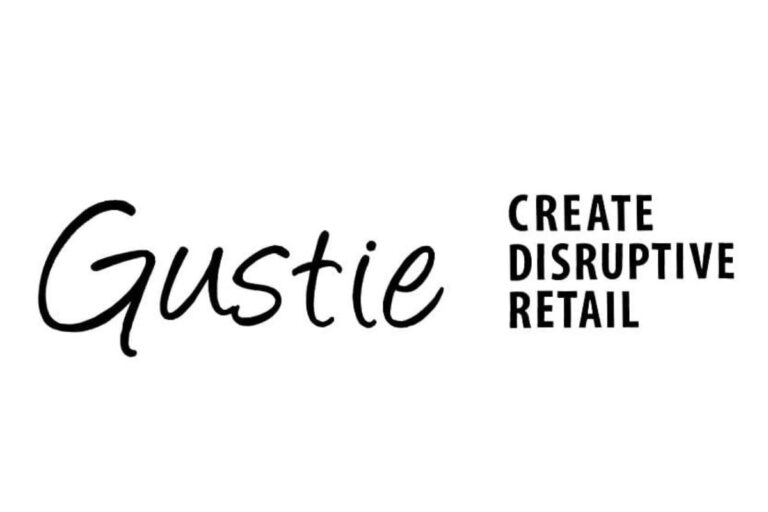 The logo of Gustie with the tagline "CREATE DISRUPTIVE RETAIL".
