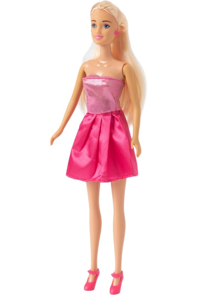 Barbie doll with blonde hair in a pink strapless dress and matching pink heels against a white background.